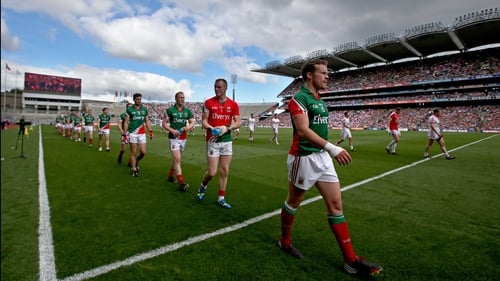 Andy Moran leads Mayo during the parade ahead of their semi-final win over Tyrone