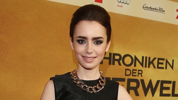 Lily Collins is the daughter of British singer Phil Collins