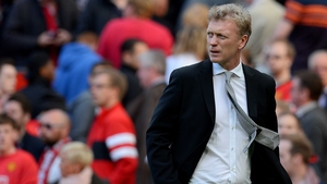 David Moyes shoots a concerned look at his Manchester United charges