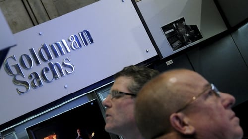 Goldman Sachs said its third quarter earnings per share fell to $4.79 from $6.28 a year earlier