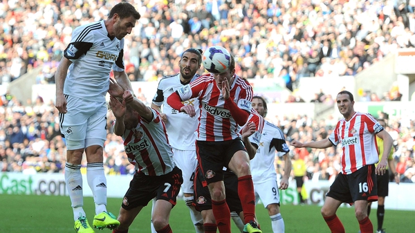 Angel Rangel heads Swansea in front against Sunderland