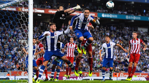 Espanyol goalkeeper Kiko Casilla clears the ball during the win against Atletico