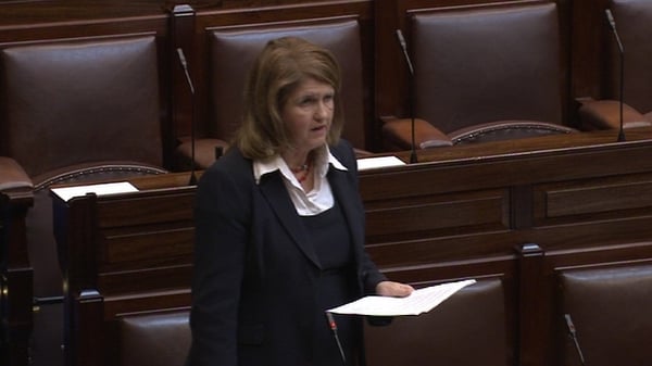 Joan Burton acknowledged the reduction of €226m would cause difficulties