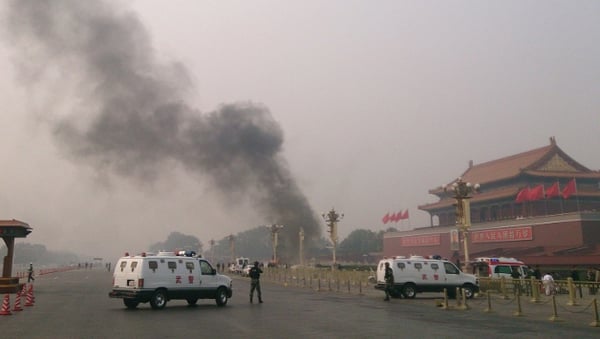 Chinese Police said on their official microblog that the car veered off the road at the north of the square, crossed the barriers and caught fire