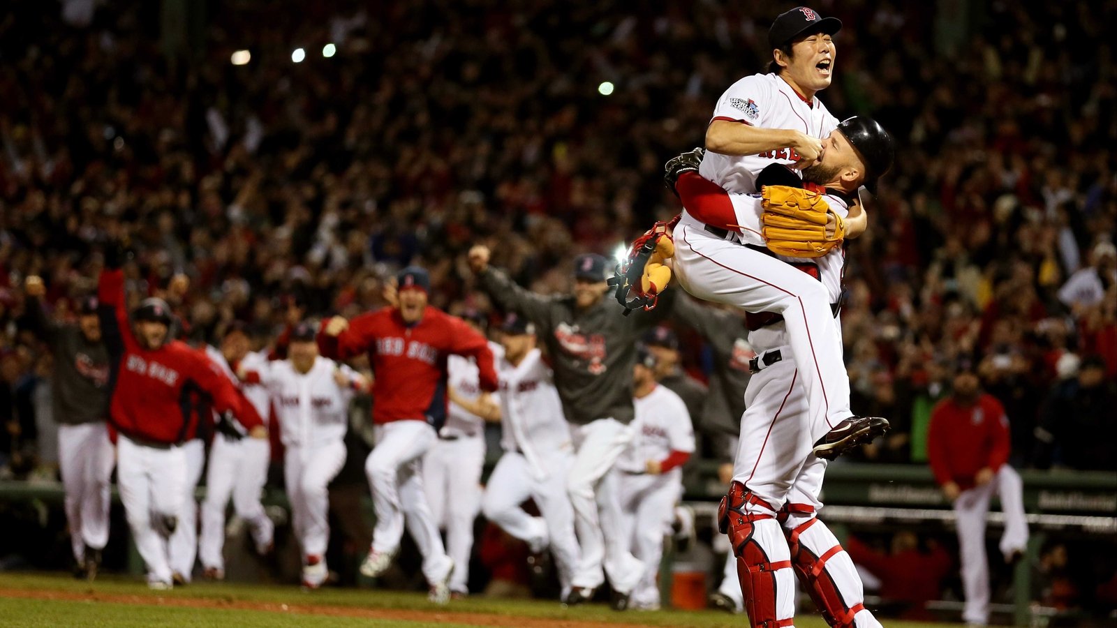 Boston Red Sox David Ross holds the trophy after the Red Sox defeated the  St. Louis Cardinals 6-1 in game six of the World Series at Fenway Park in  Boston on October