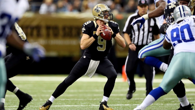Quarterback Drew Brees #9 of the New Orleans Saints drops back to pass against the Dallas Cowboys 