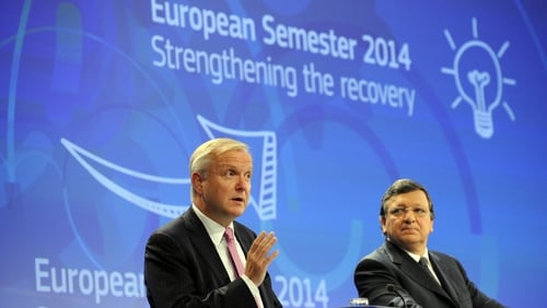 Olli Rehn (L) said Ireland was an example as to how a bailout programme can work and should work