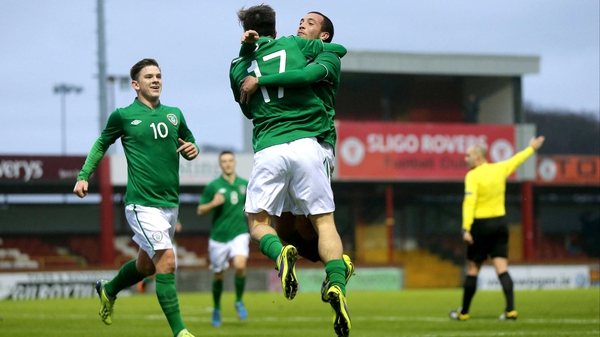 Jack Grealish celebrates scoring the third goal with Samir Carruthers