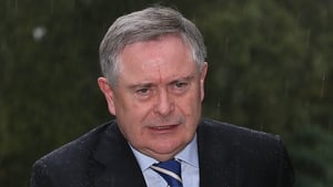 Brendan Howlin said performance-related pay would not return until at least 2016