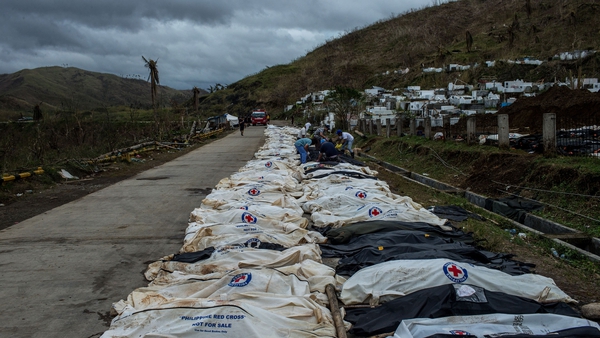 Bodies on the roadside in the Tacloban region, awaiting burial