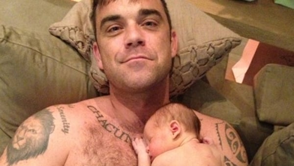 The pic that Robbie tweeted with his daughter Theodora shortly after she was born