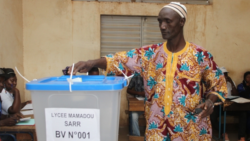 A man casts his vote at a polling station in Bamako, Mali