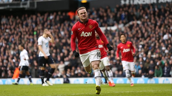 Wayne Rooney celebrates his second goal against Spurs