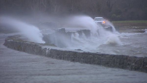 Strong winds throw water on to a road in Co Sligo