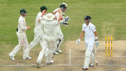 Joe Root walks after being caught out