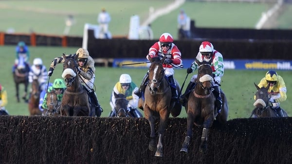 Mountainous (right) clear the last to win The Coral Welsh Grand National from Hawkes Point (left)