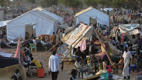 South Sudanese continue to flock to a makeshift camp as fears over fighting fester