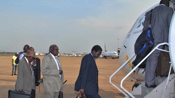 Members of South Sudan's government board a flight bound for Addis Ababa