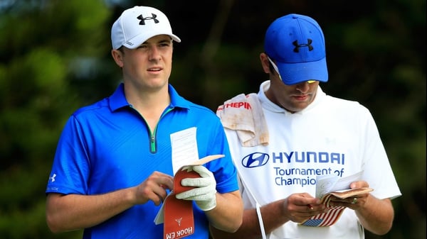Jordan Spieth with his caddie at the second hole
