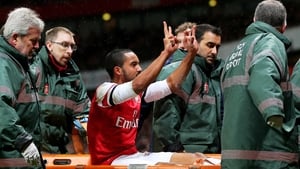 Theo Walcott said he didn't regret his 2-0 gesture to Tottenham fans