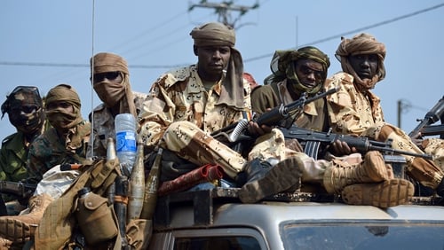 Chadian troops of the African-led International Support Mission to the Central African Republic (MISCA) patrol following the resignation of the Central African Republic president in Bangui