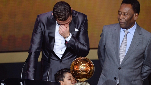Cristiano Ronaldo accepted the award from Pele