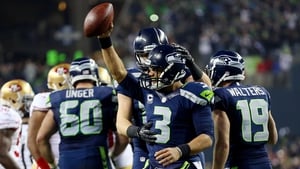 Quarterback Russell Wilson (3) of the Seattle Seahawks celebrates after seeing off the San Francisco 49ers
