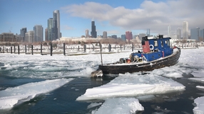 A tugboat breaks up ice in Burnham Harbor in Chicago, Illinois South Sudan rivals sign ceasefire deal