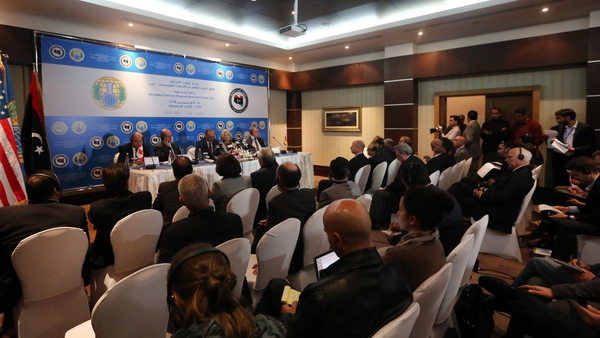 Journalists attend a press conference held by the Organisation for the Prohibition of Chemical Weapons (OPCW) in Tripoli