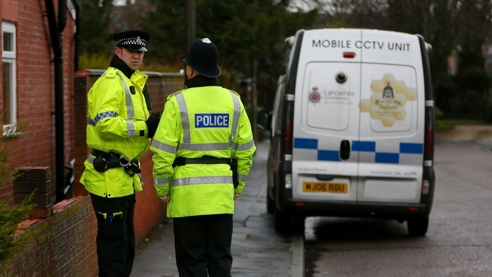 Two arrested after baby killed by dog in England