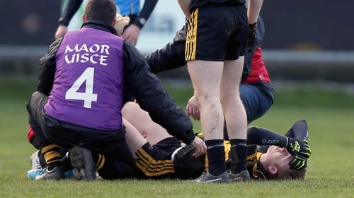 Colm Cooper lies injured on the O'Moore Park pitch in Portlaoise