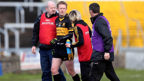Colm Cooper leaving the field after damaging his cruciate
