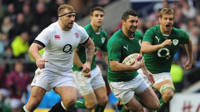 Rob Kearney surges through the England defence to touch down for Ireland
