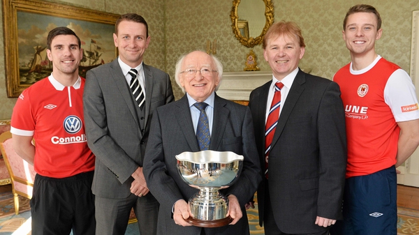 President Michael D Higgins with players and managers of Sligo Rovers and St Patrick's Athletic