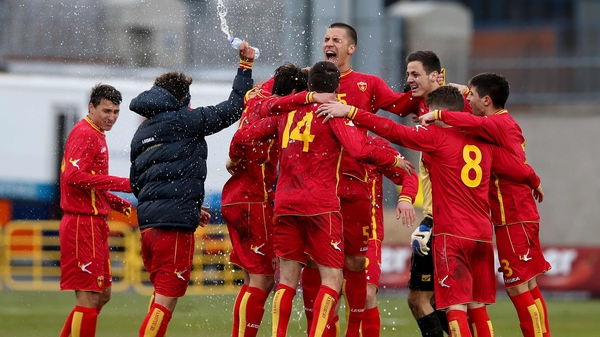 Montenegro celebrate their late win in Tallaght