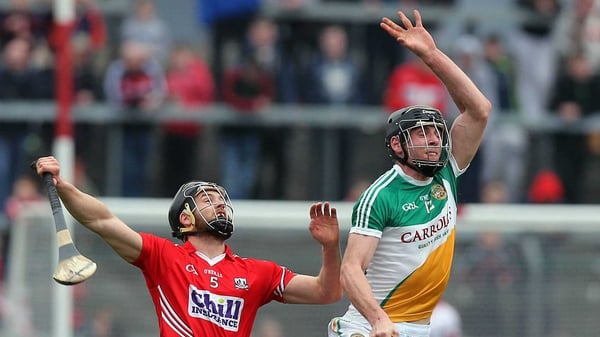 Eoin Cadogan of Cork with Conor Mahon of Offaly