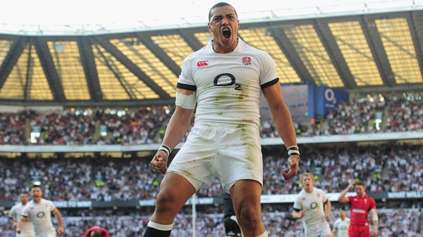 Luther Burrell celebrates scoring for England, the centre's third try of this year's Six Nations Championship
