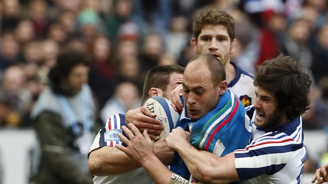 Sergio Parisse is double tackled playing against France