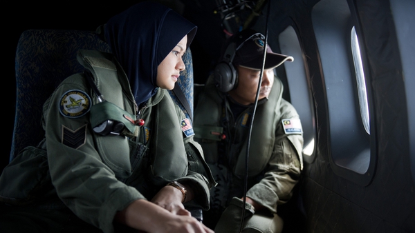Crew members from a Malaysian Air Force aircraft during a search over the Strait of Malacca