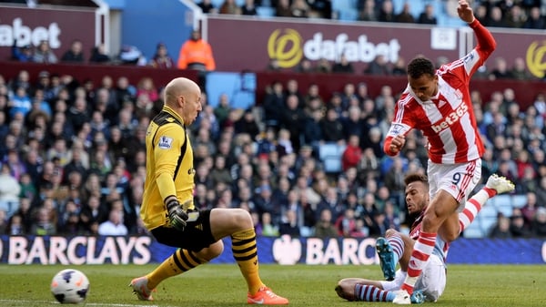 Peter Odemwingie scores past goalkeeper Brad Guzan to cancel out Aston Villa's opener