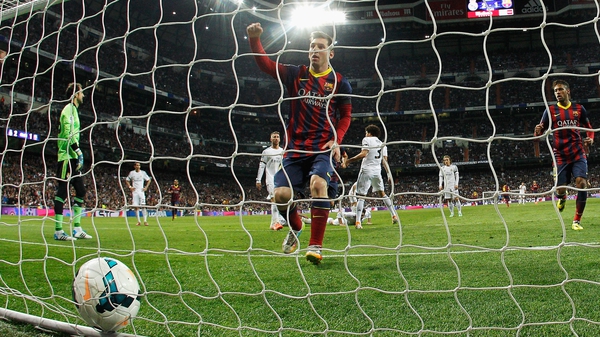 Hat-trick hero Lionel Messi slots home a penalty for Barca