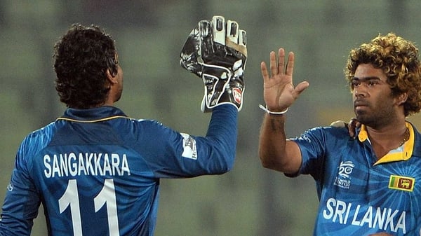 Sri Lankan bowler Lasith Malinga (R) and team-mate Kumar Sangakkara (L) will travel to Ireland in May