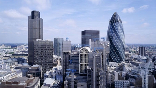 London's 'Gherkin' (on the right) was on the market for £650 million, but is believed to have sold for more