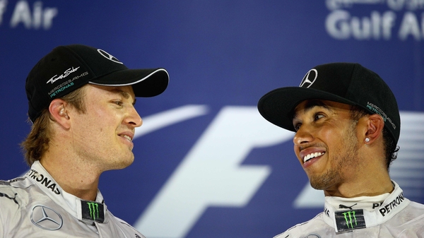 Lewis Hamilton (right) has had another dig at team-mate Nico Rosberg (left)