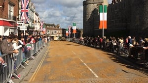 Crowds gather in Windsor to see the presidential party along with Prince Charles and his wife process in carriages to Windsor Castle