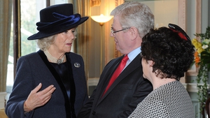 Tánaiste Eamon Gilmore and his wife chat to the Duchess of Cornwall at the Irish Embassy