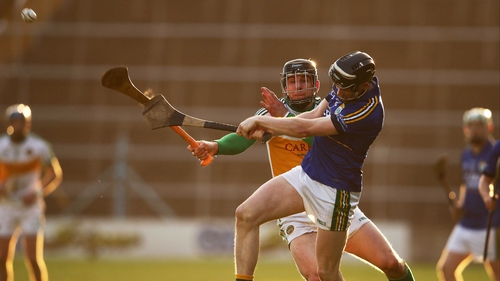 Offaly's Conor Mahon and Colm Harty of Kerry