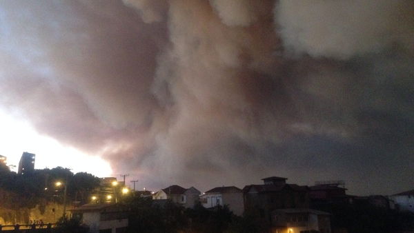 Giant plumes of smoke could be seen over the port city (Pic: EPA)