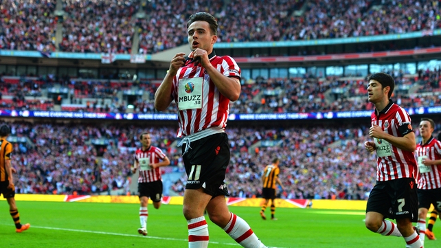 United 's Jose Baxter celebrates after opening the scoring 