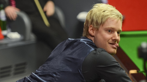 Neil Robertson reacts after missing the black for a century break against Mark Allen